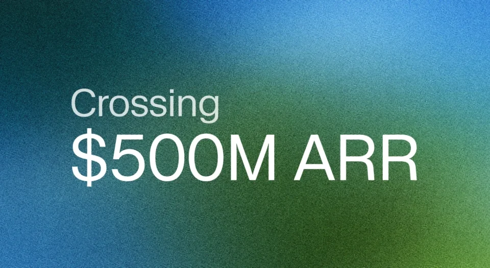 Text over a blue-green gradient: 'Crossing $500M ARR' indicating a milestone achievement
