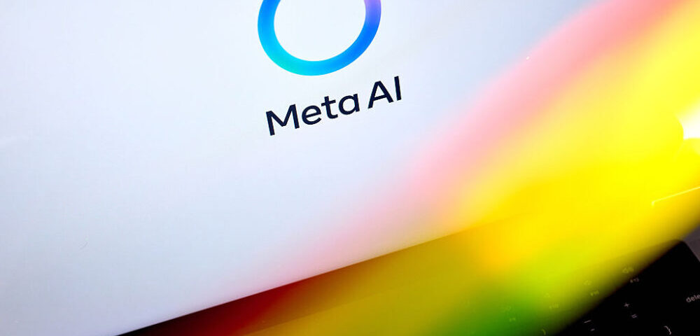 Article Image - Best AI Tools Meta AI logo and the text 'Meta AI' on white background with a blue circular ring and rainbow gradient across the lower edge.