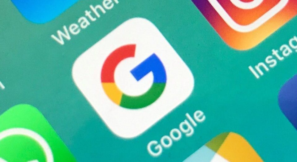 Article Image - Best AI Tools Close-up of a smartphone home screen showing the Google app icon (multicolor G) among other app icons like Weather and Instagram.